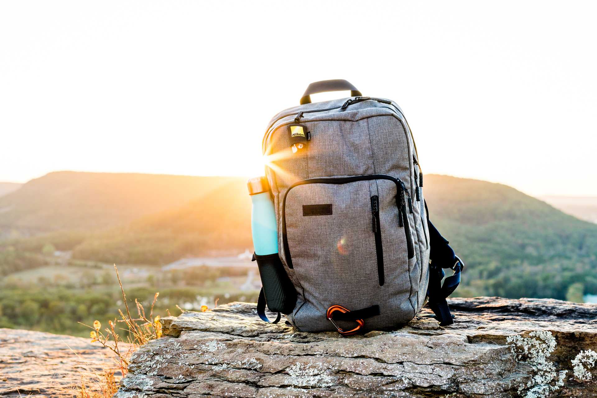 A backpack outside at sunset