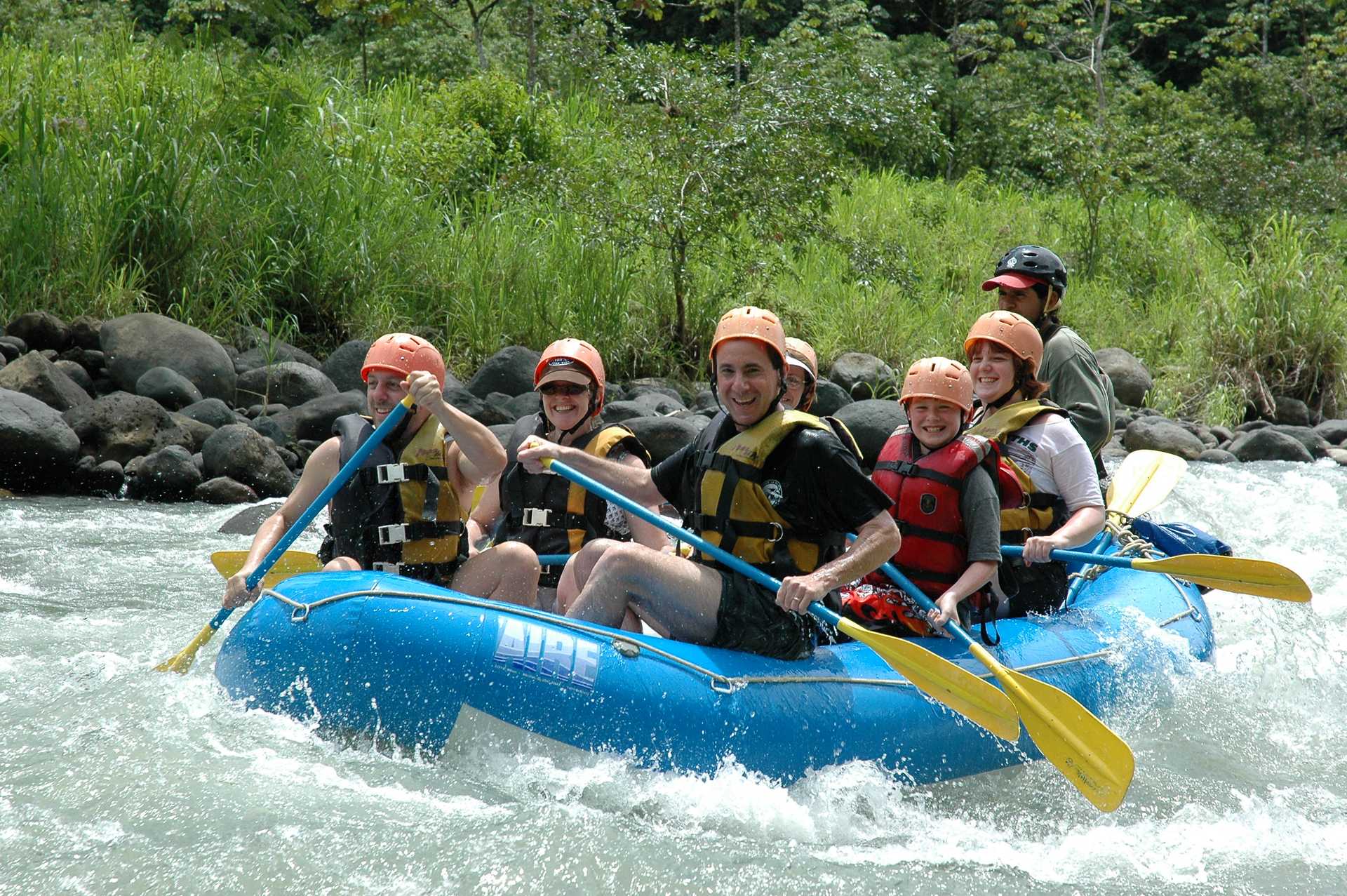 A family rafting on a river