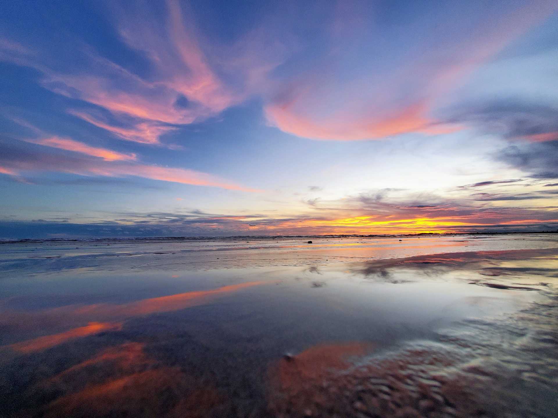 A colorful sunset by the ocean