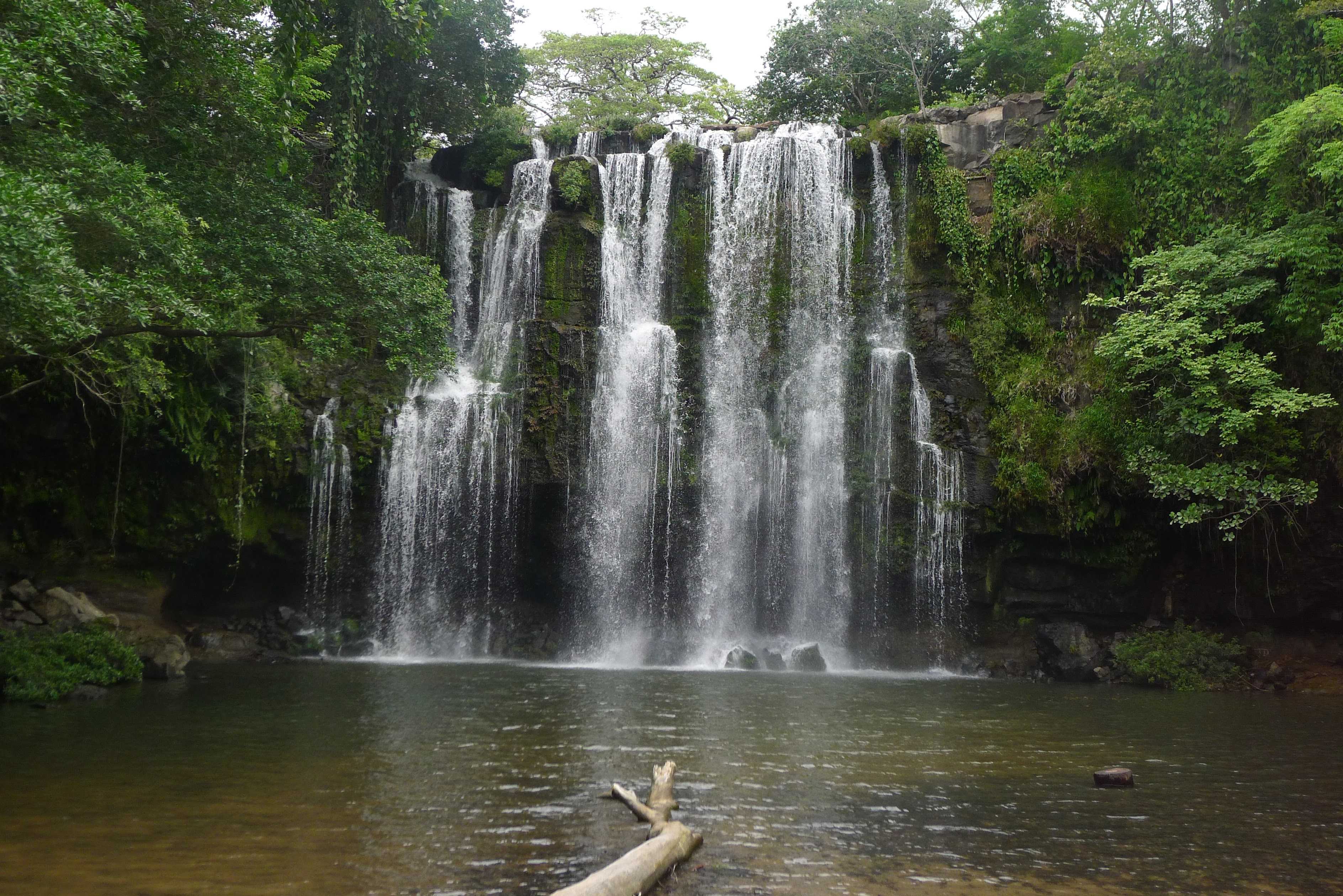 A waterfall surrounded by nature