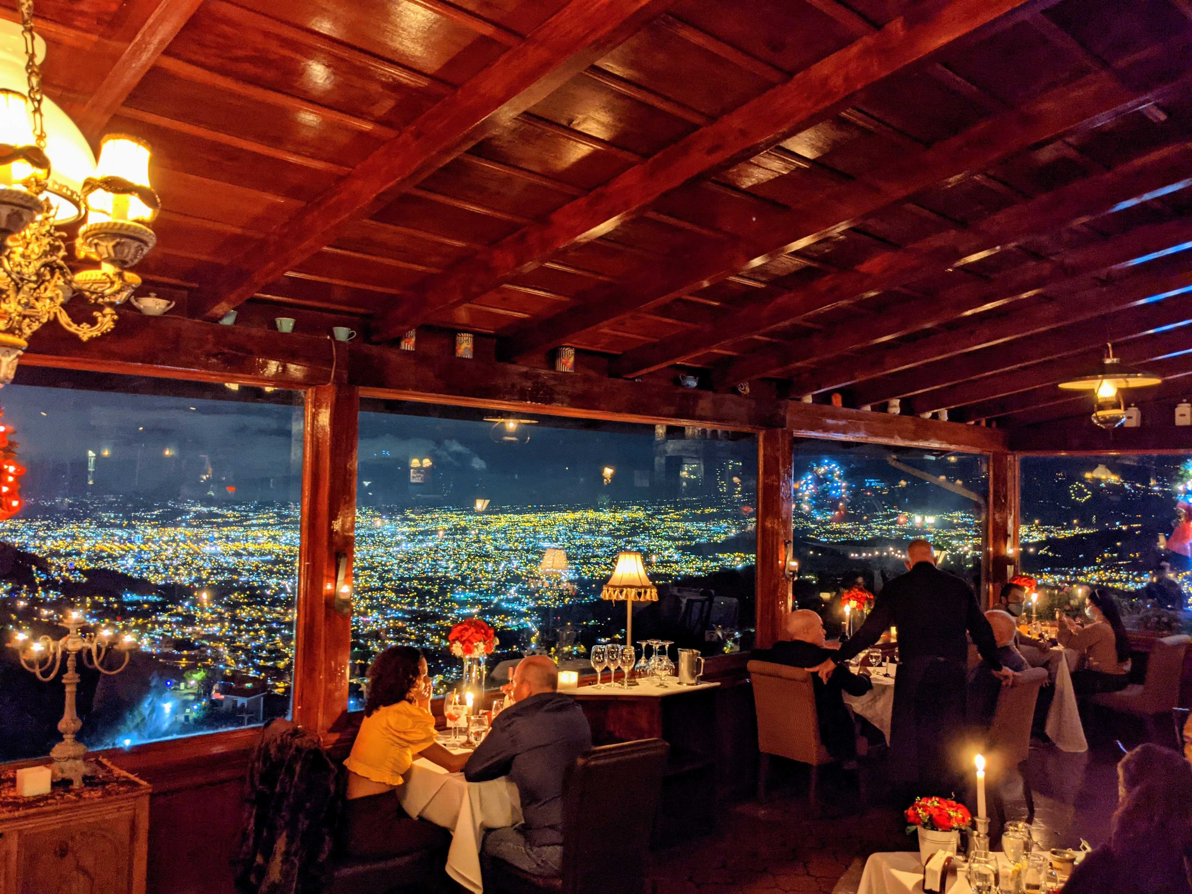 People dining at a restaurant at night